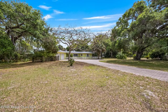 8690 S Tropical Trail, Merritt Island, FL 32952