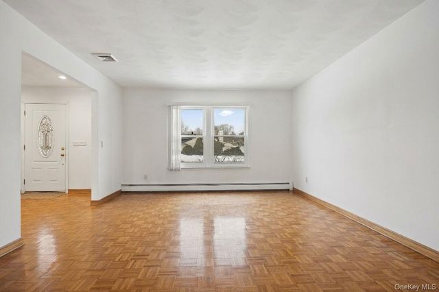 21 Apple Blossom Lane, East Patchogue, NY 11772