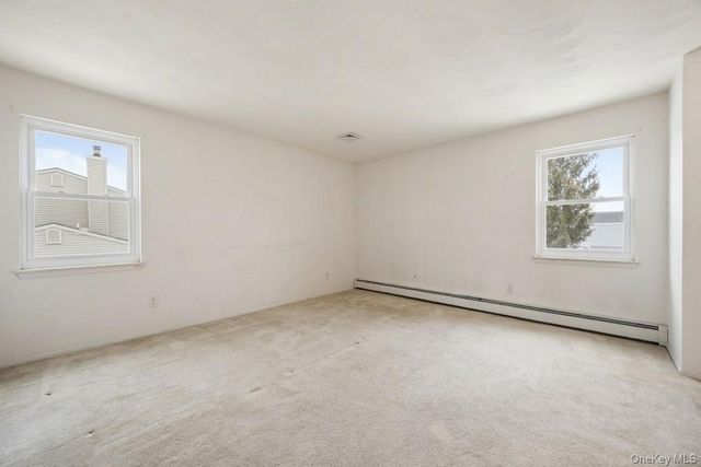 21 Apple Blossom Lane, East Patchogue, NY 11772