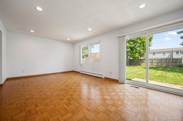 21 Apple Blossom Lane, East Patchogue, NY 11772