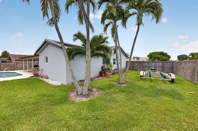 6521 Woodbury Road, Boca Raton, FL 33433