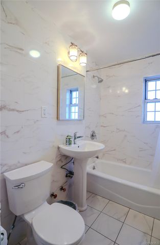 211-07 73 Avenue A, Bayside, NY 11364
