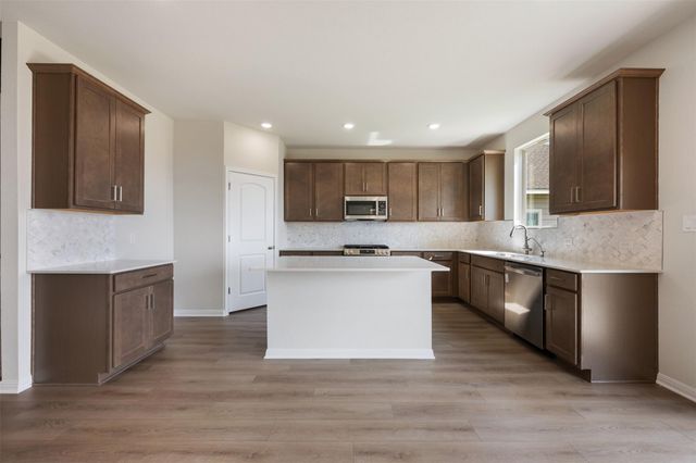 107 Holzinger BND, Bastrop, TX 78602