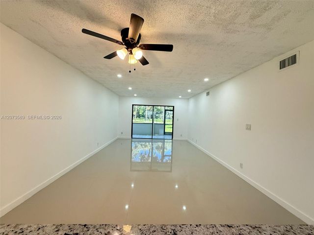 6095 N Sabal Palm Boulevard 103, Tamarac, FL 33319