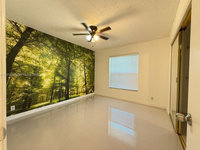 6095 N Sabal Palm Boulevard 103, Tamarac, FL 33319