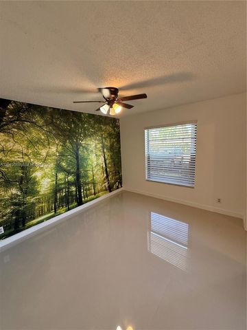 6095 N Sabal Palm Boulevard 103, Tamarac, FL 33319
