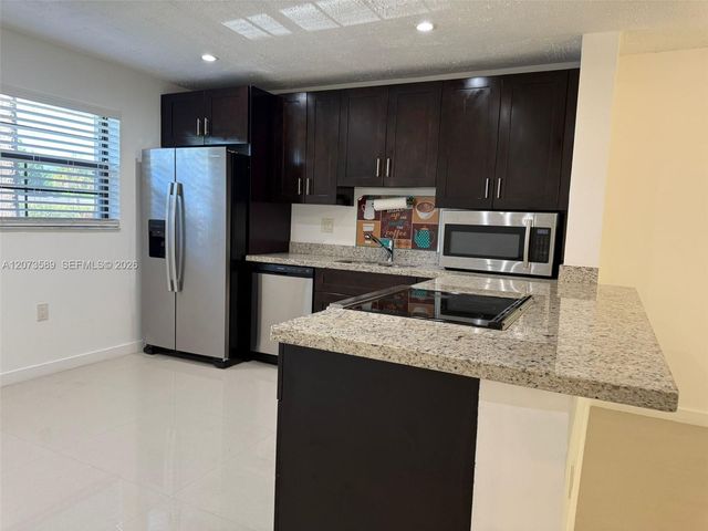 6095 N Sabal Palm Boulevard 103, Tamarac, FL 33319