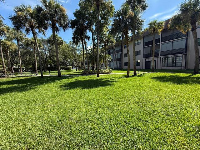 6095 N Sabal Palm Boulevard 103, Tamarac, FL 33319