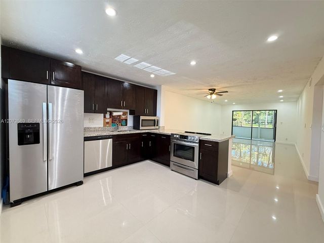 6095 N Sabal Palm Boulevard 103, Tamarac, FL 33319