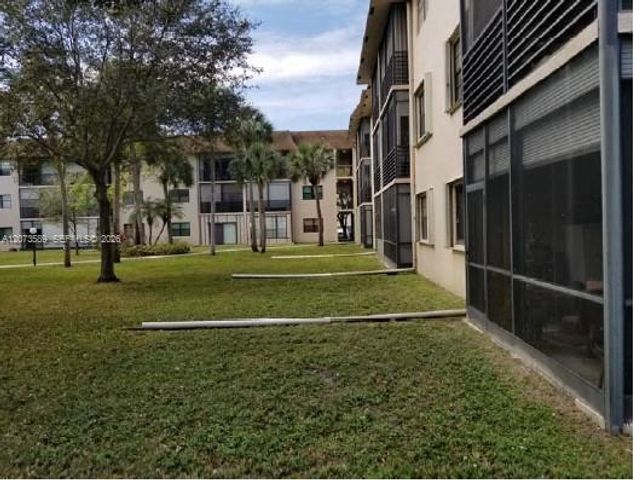 6095 N Sabal Palm Boulevard 103, Tamarac, FL 33319