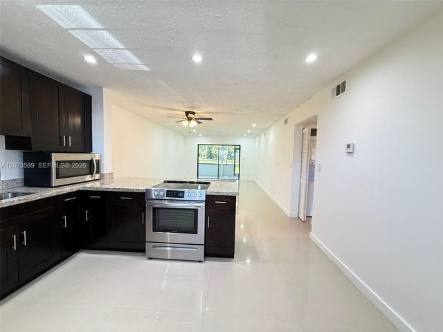 6095 N Sabal Palm Boulevard 103, Tamarac, FL 33319