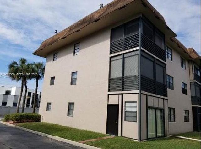 6095 N Sabal Palm Boulevard 103, Tamarac, FL 33319