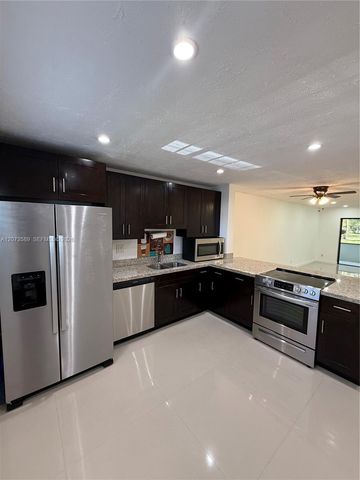 6095 N Sabal Palm Boulevard 103, Tamarac, FL 33319
