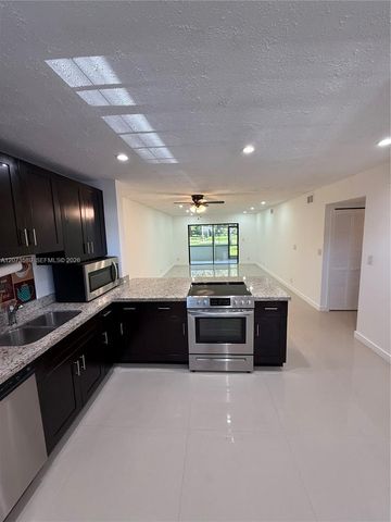 6095 N Sabal Palm Boulevard 103, Tamarac, FL 33319