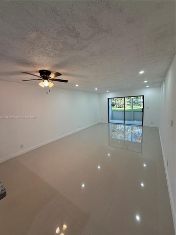 6095 N Sabal Palm Boulevard 103, Tamarac, FL 33319