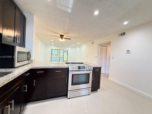 6095 N Sabal Palm Boulevard 103, Tamarac, FL 33319