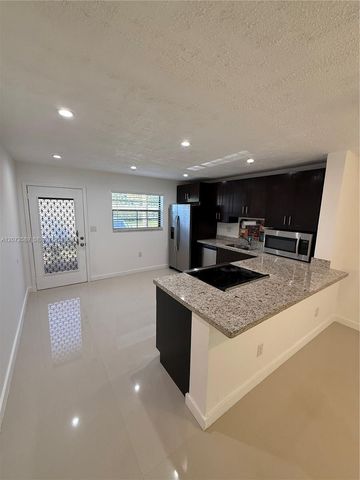 6095 N Sabal Palm Boulevard 103, Tamarac, FL 33319
