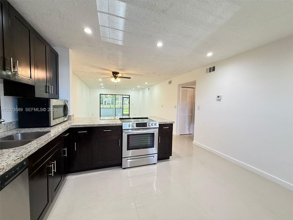 6095 N Sabal Palm Boulevard 103, Tamarac, FL 33319