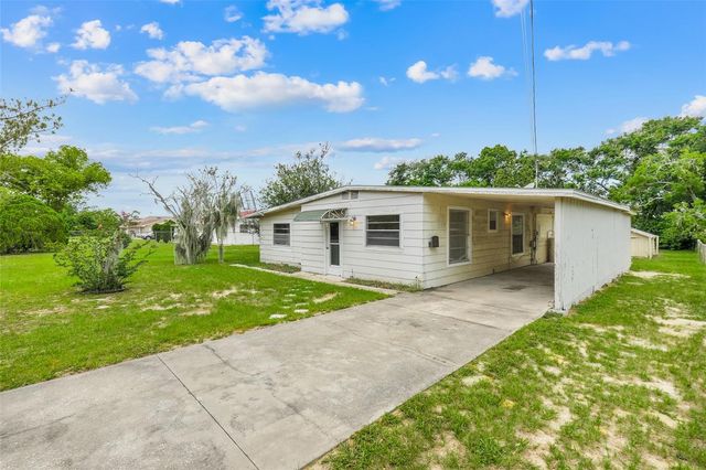11411 HUGGINS ST, Leesburg, FL 34788