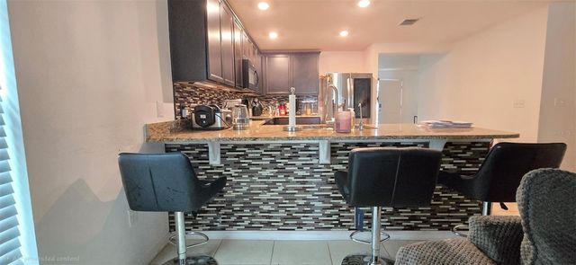 1528 E FALMOUTH AVENUE, Deltona, FL 32725