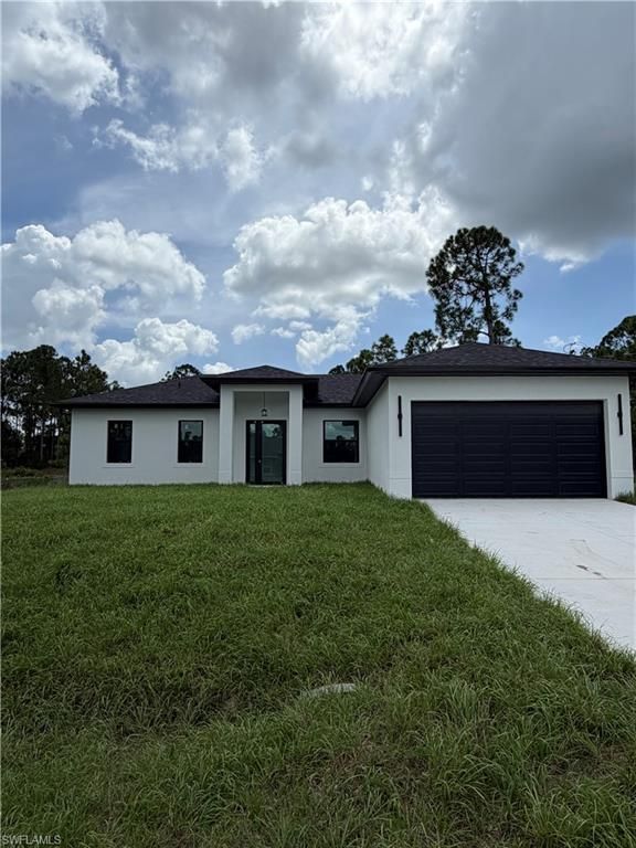 1052 Grove ST E, LEHIGH ACRES, FL 33974 — exterior
