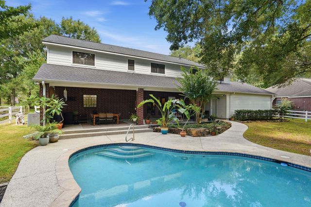 2312 Hollowbrook Lane, Conroe, TX 77384