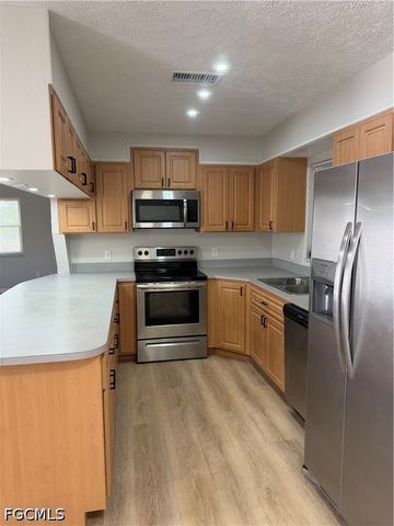 1403 SE 11th ST, Cape Coral, FL 33990
