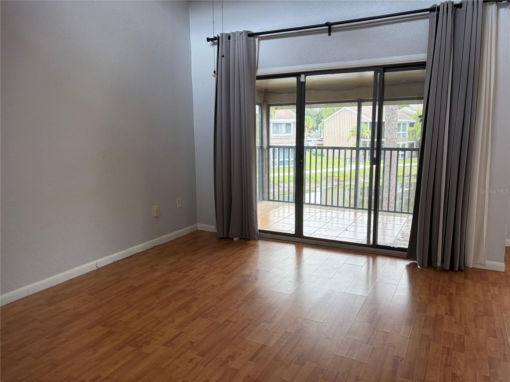 Image 3 of property listing at 5926 PEREGRINE AVENUE A13, Orlando, FL 32819