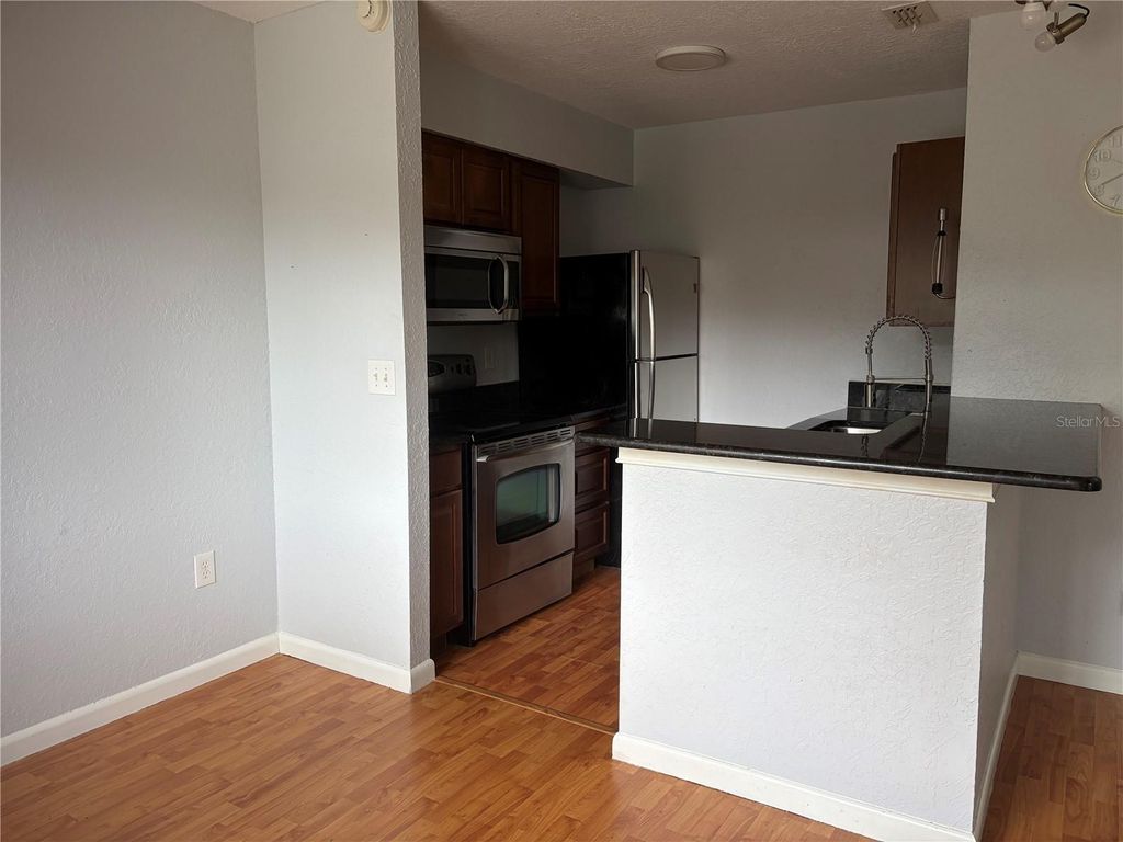 Image 6 of property listing at 5926 PEREGRINE AVENUE A13, Orlando, FL 32819
