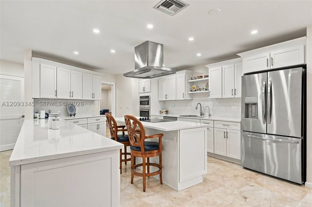 444 Glenbrook Dr, Atlantis, FL 33462