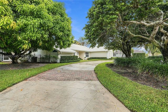 444 Glenbrook Dr, Atlantis, FL 33462