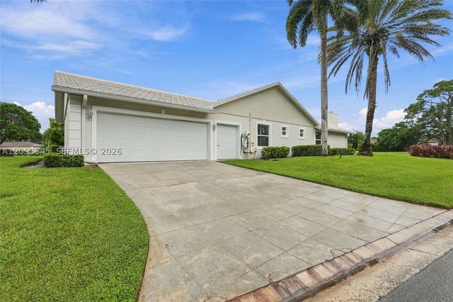 444 Glenbrook Dr, Atlantis, FL 33462