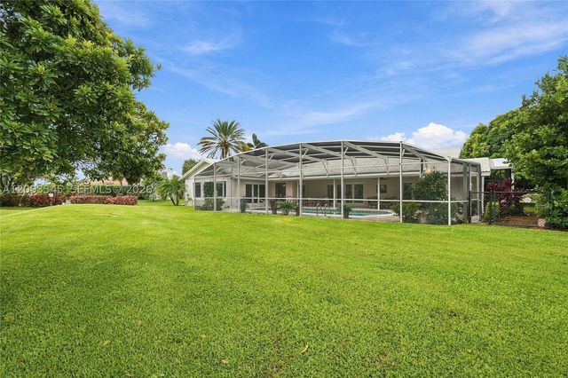 444 Glenbrook Dr, Atlantis, FL 33462