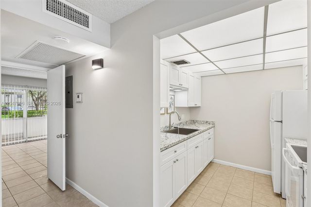 13455 SW 9th Court 108J, Pembroke Pines, FL 33027