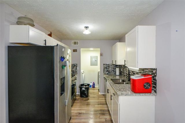 1126 Mainstreet Valley Drive, Stone Mountain, GA 30088