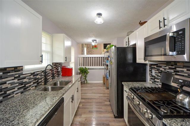 1126 Mainstreet Valley Drive, Stone Mountain, GA 30088