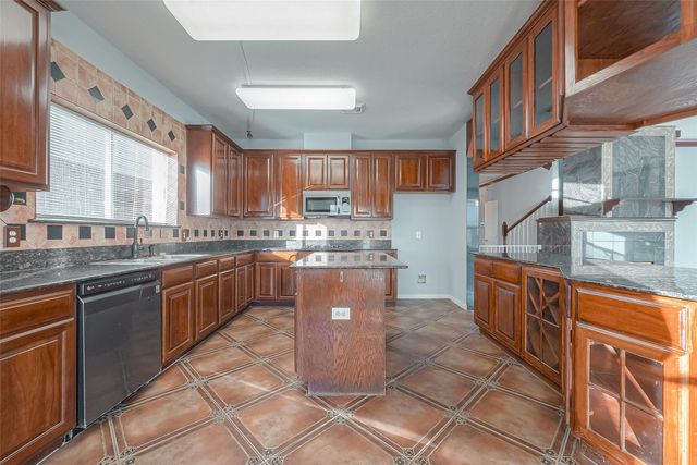 9407 Demsey Mill Drive, Sugar Land, TX 77498