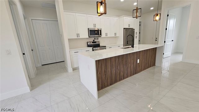 1402 5th AVE, Lehigh Acres, FL 33972