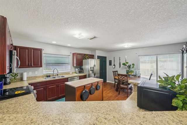 1438 BLOSSOM BAYOU CIRCLE, Ruskin, FL 33570