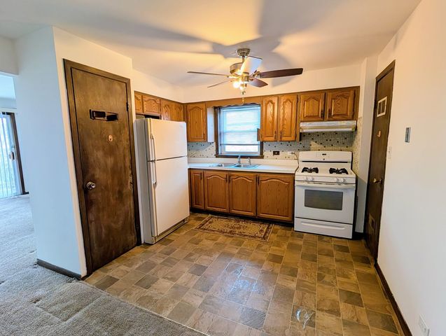 8143 Marion Drive 3E, Justice, IL 60458