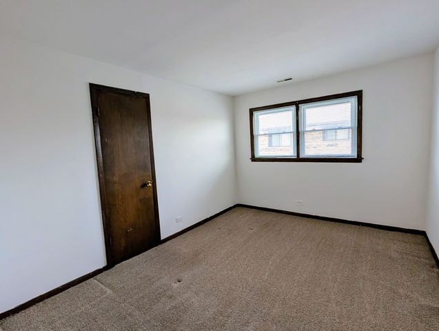 8143 Marion Drive 3E, Justice, IL 60458