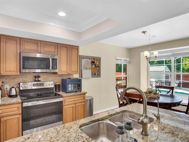 1802 WOOD STOCK CIRCLE, Tarpon Springs, FL 34689