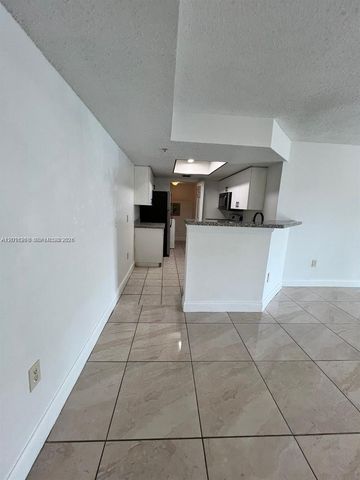 5065 Wiles Road 103, Coconut Creek, FL 33073