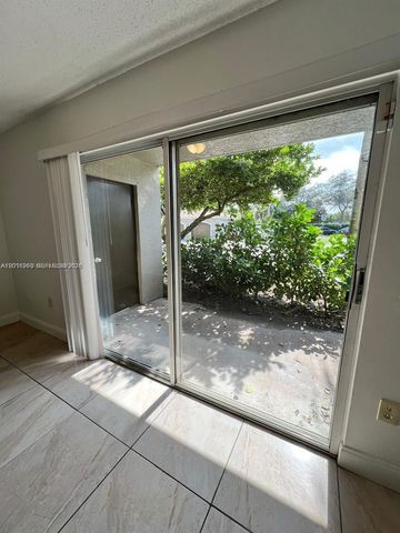5065 Wiles Road 103, Coconut Creek, FL 33073