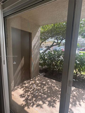 5065 Wiles Road 103, Coconut Creek, FL 33073