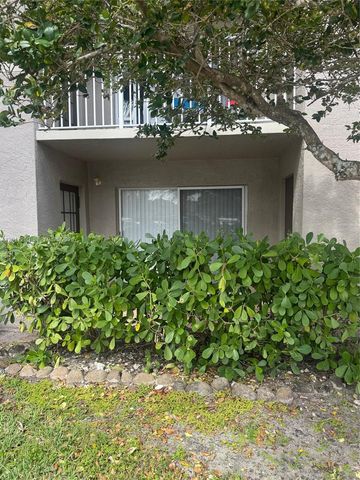 5065 Wiles Road 103, Coconut Creek, FL 33073