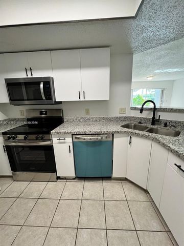 5065 Wiles Road 103, Coconut Creek, FL 33073