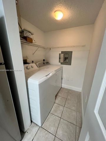 5065 Wiles Road 103, Coconut Creek, FL 33073