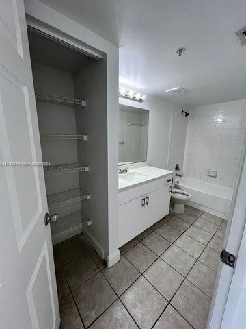 5065 Wiles Road 103, Coconut Creek, FL 33073