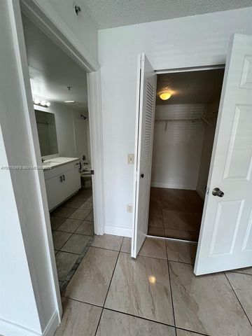 5065 Wiles Road 103, Coconut Creek, FL 33073